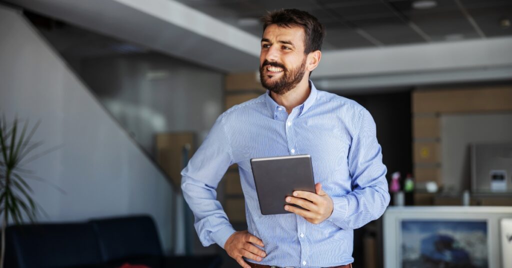 corporate man using tablet