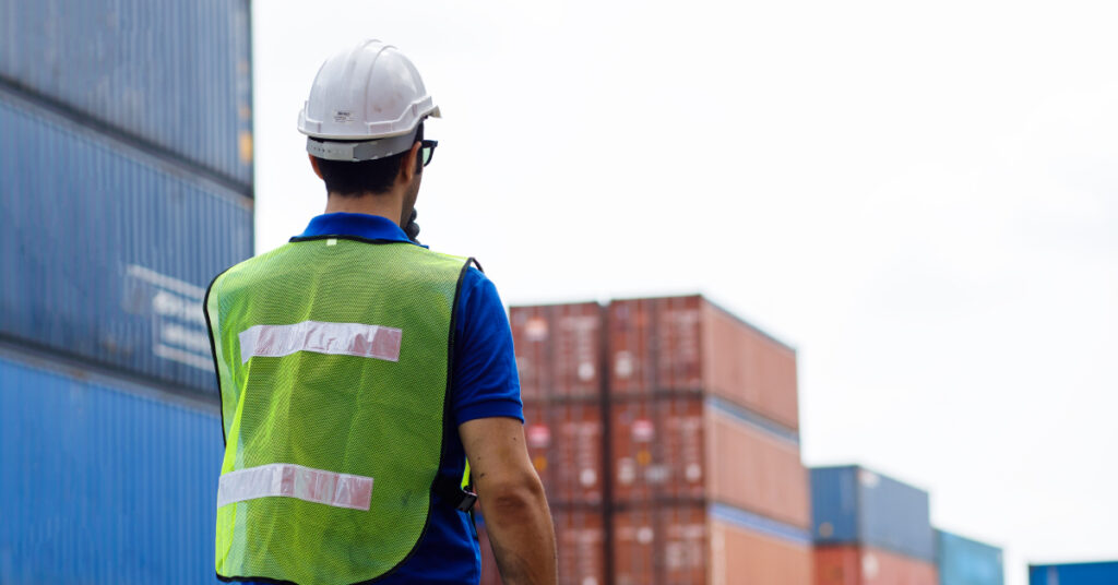 man in shipyard to show freight forwarding
