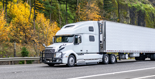 white semi-truck on the road