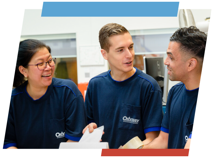 three Odyssey employees in a conversation
